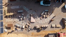 Top-down view of the stone display yard and cut pieces