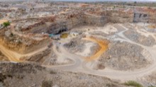 Haul roads winding through the quarry and spoil banks