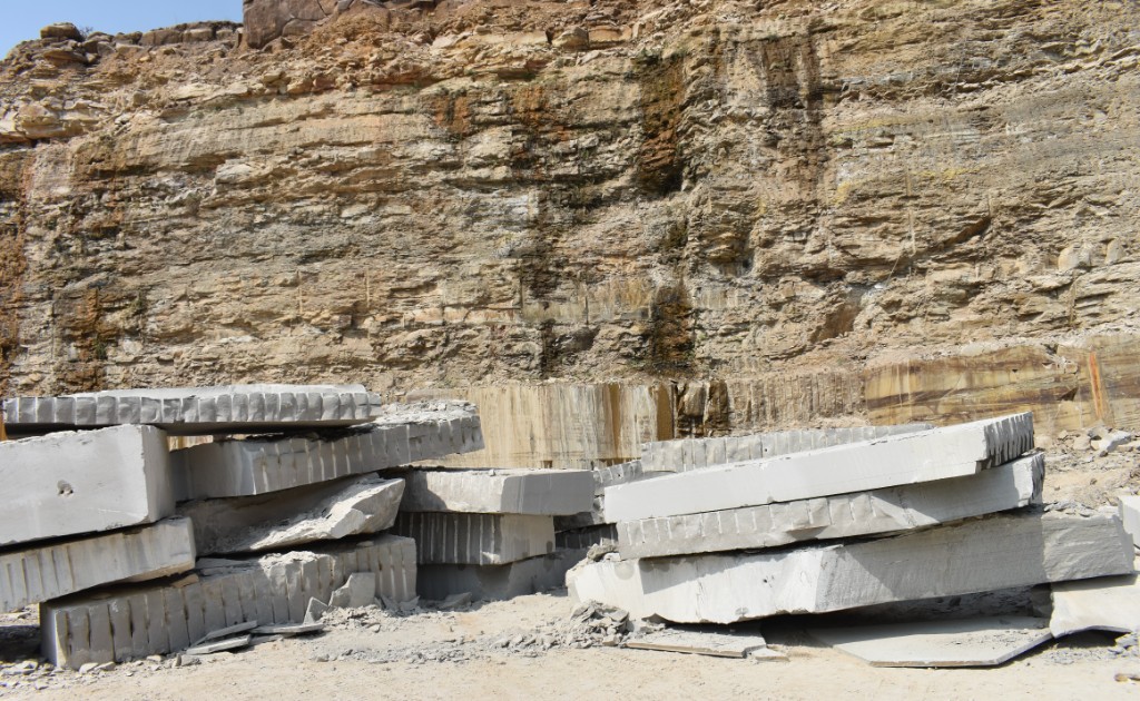 Quarry rock face and stacked blocks