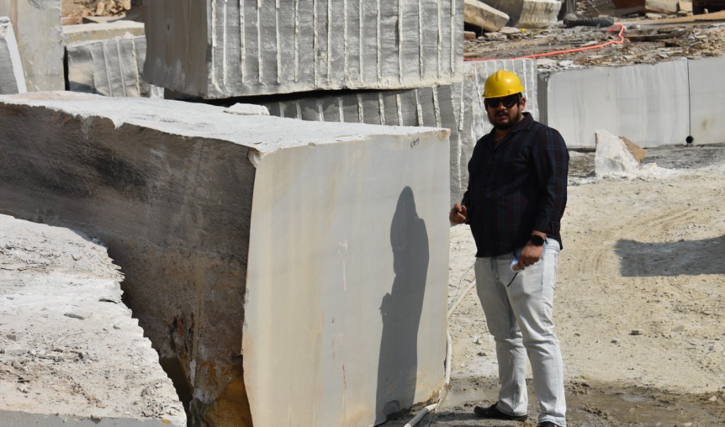 Worker with stone block