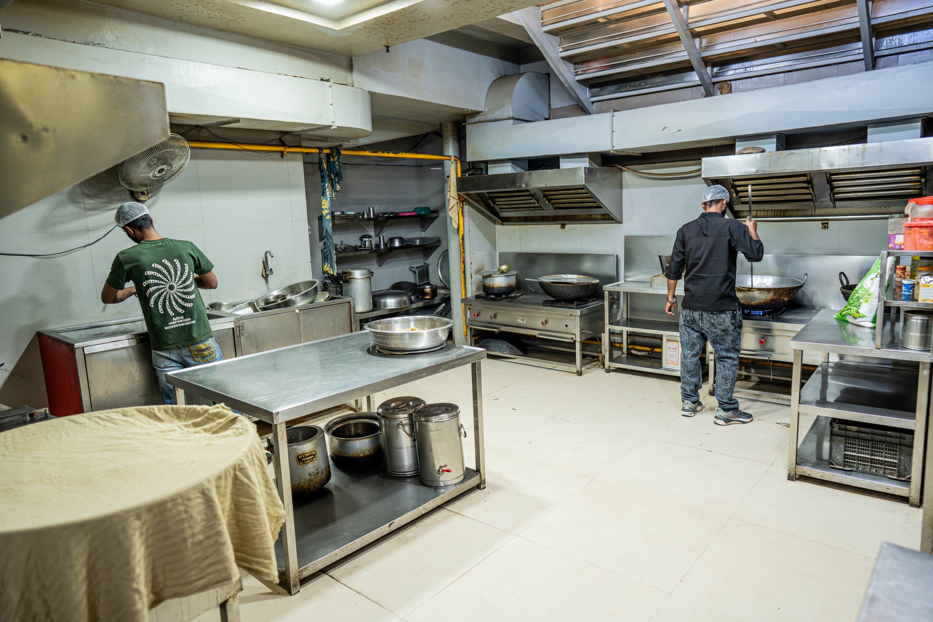 Wide view of the Vyanjanam kitchen workspace