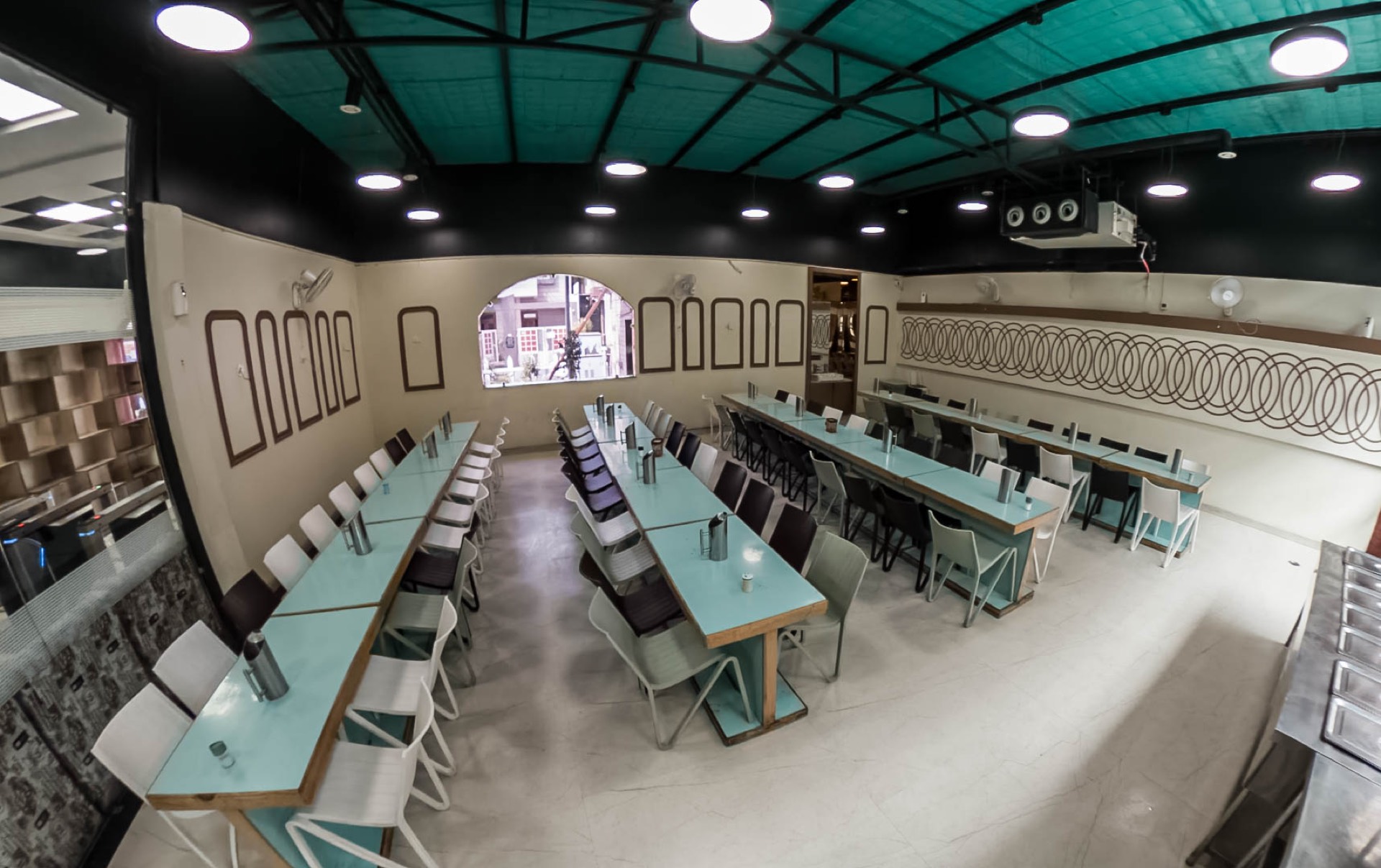 Long seating layout inside the Vyanjanam dining hall