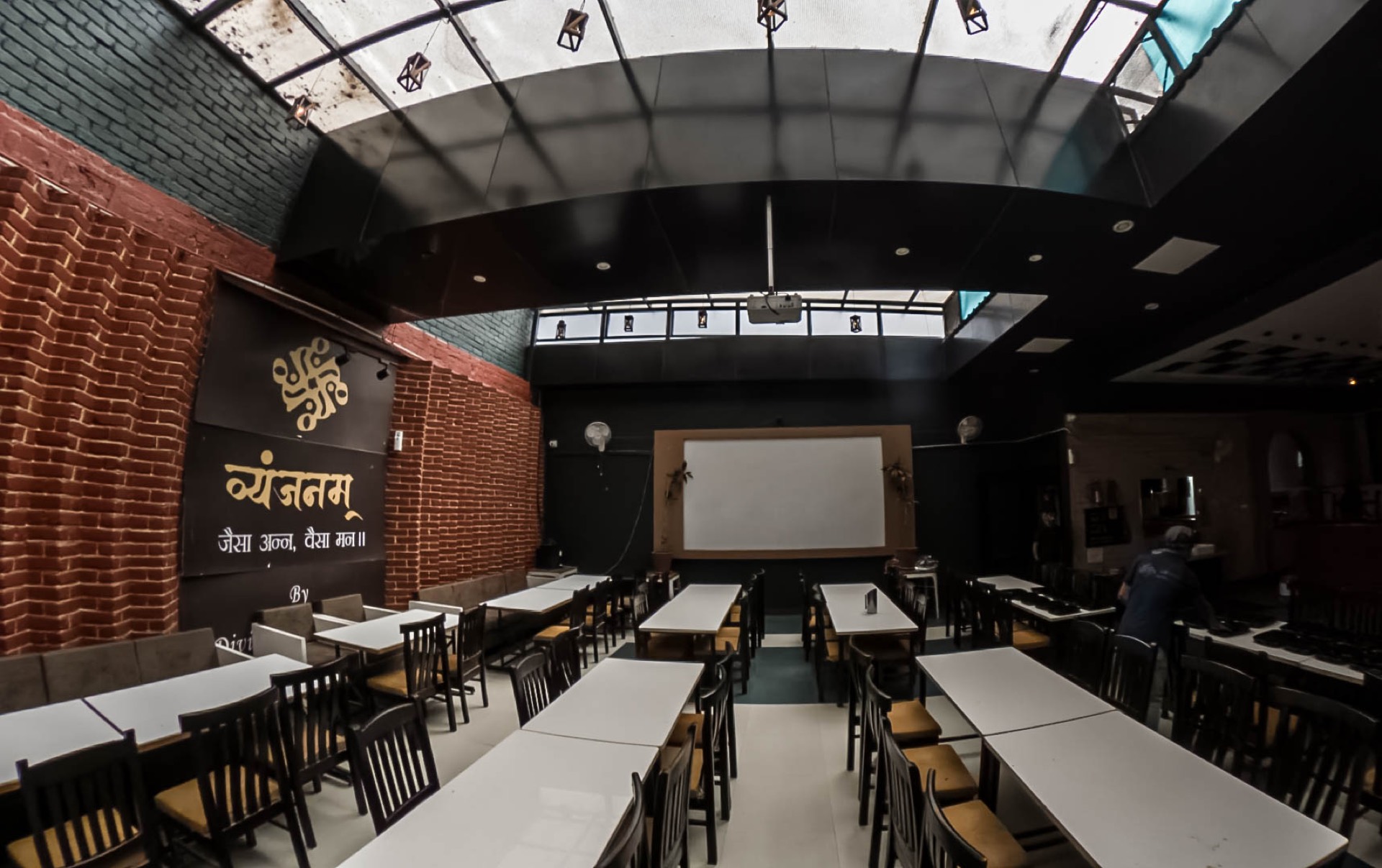 Skylit seating area inside the Vyanjanam dining hall
